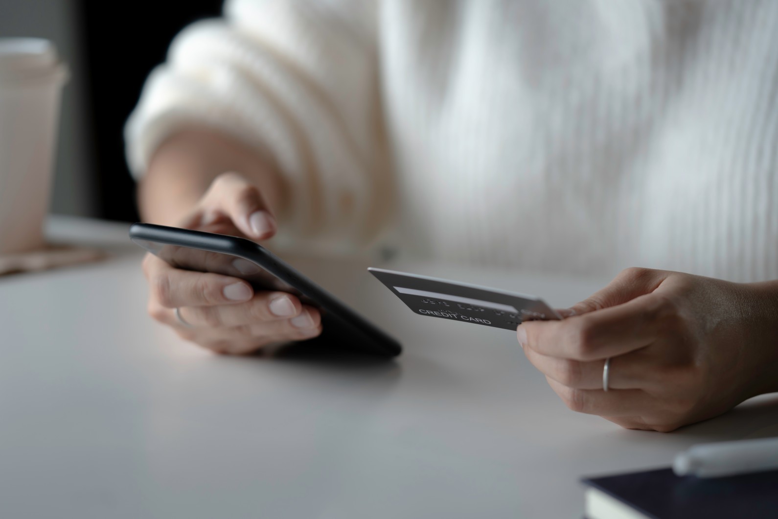 Woman-uses-phone